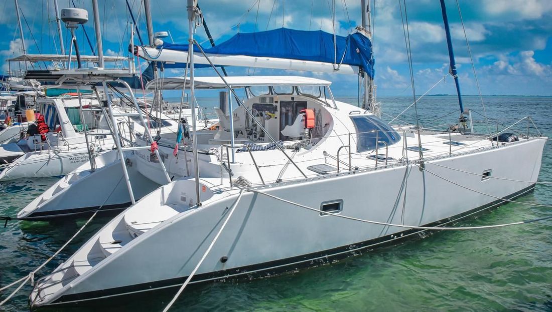 Guests on a private Cancun catamaran charter at the Isla Mujeres beach club